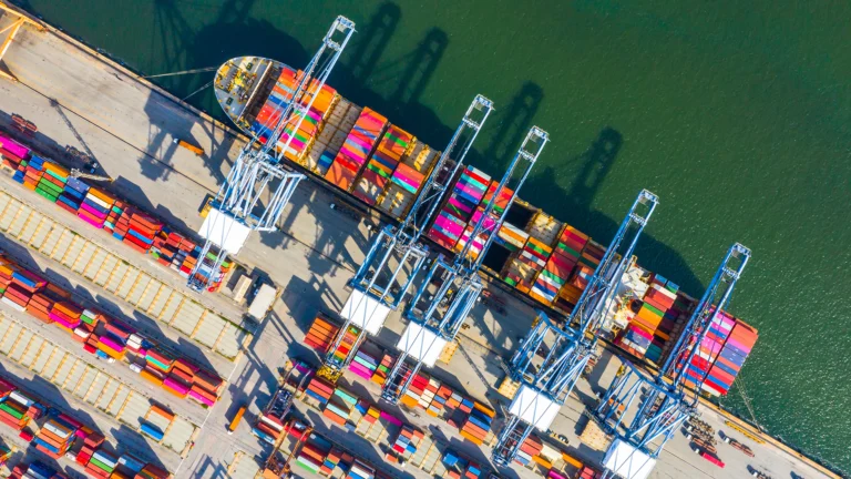 Container cranes work a busy port amid China’s price war.